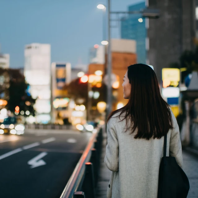 Woman walking in city